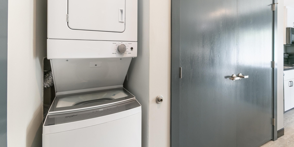 Each of Boomer Town Luxury Studios' apartments come with a stacking washer and dryer.